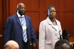 Trayvon's mother and father (Tracy Martin and Sabrina Fulton) arrives at court